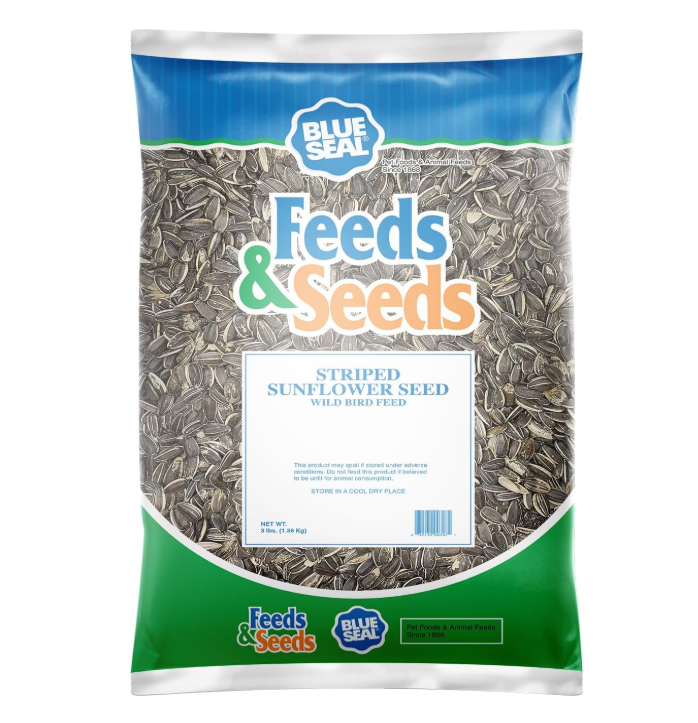 Bag of striped sunflower seeds with 'Feeds & Seeds' branding on a white background