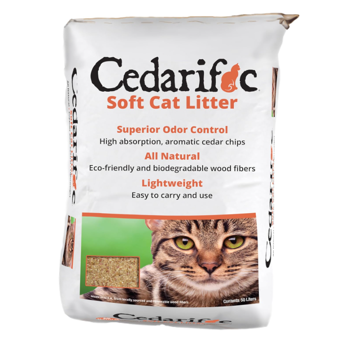 Bag of Cedarific cat litter with a picture of a cat's face, against a white background.