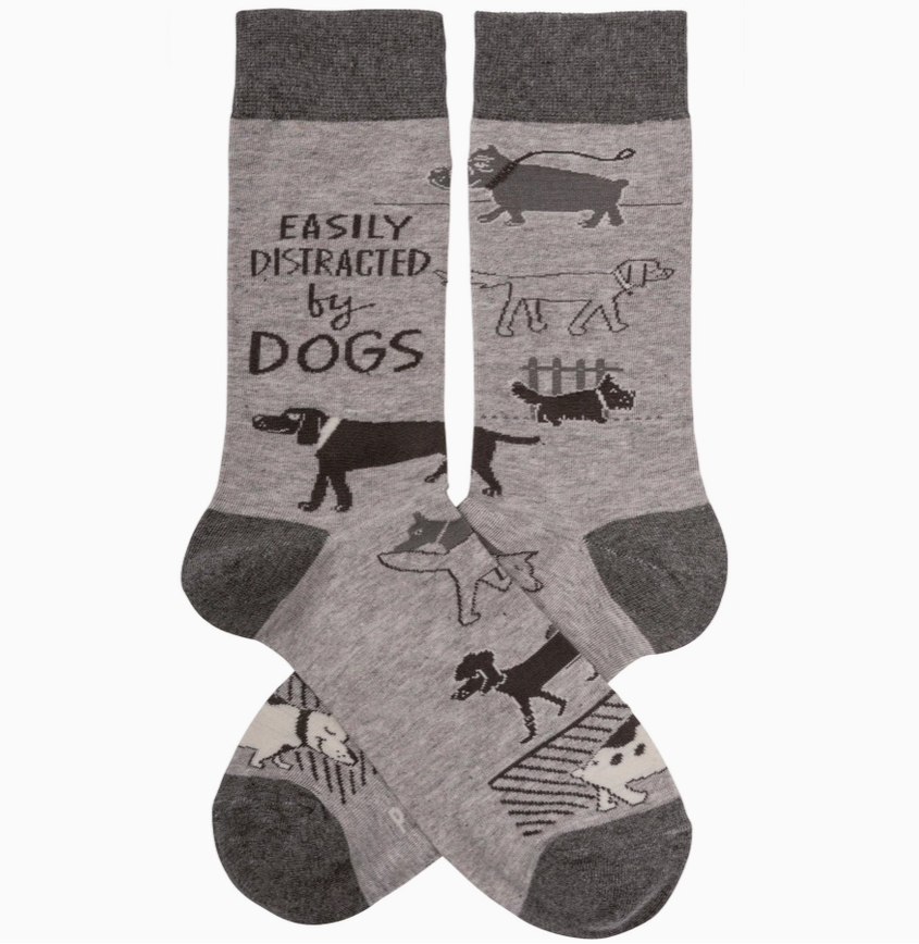 Gray socks with dog illustrations and text on a white background