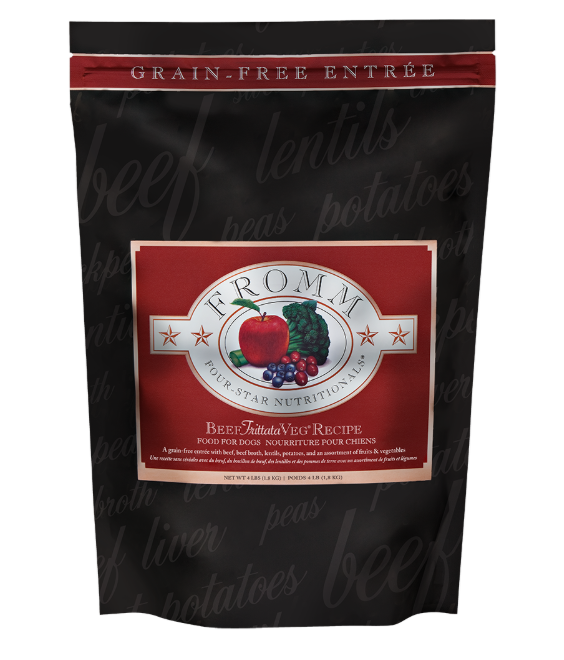 Bag of Fromm beef flavored dog food with burgundy label on black background.