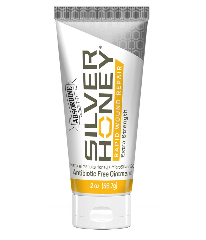 Tube of Silver Honey wound repair ointment on a white background