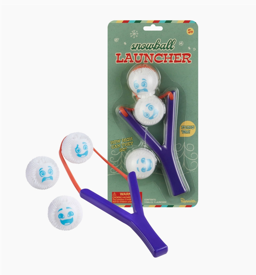 Snowball launcher with three snowballs on a white background
