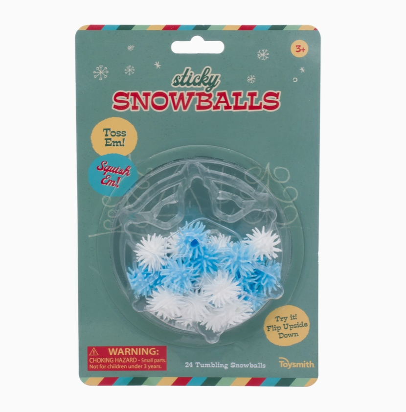 Packaging of 'Sticky Snowballs' toy with blue and white snowball shapes.