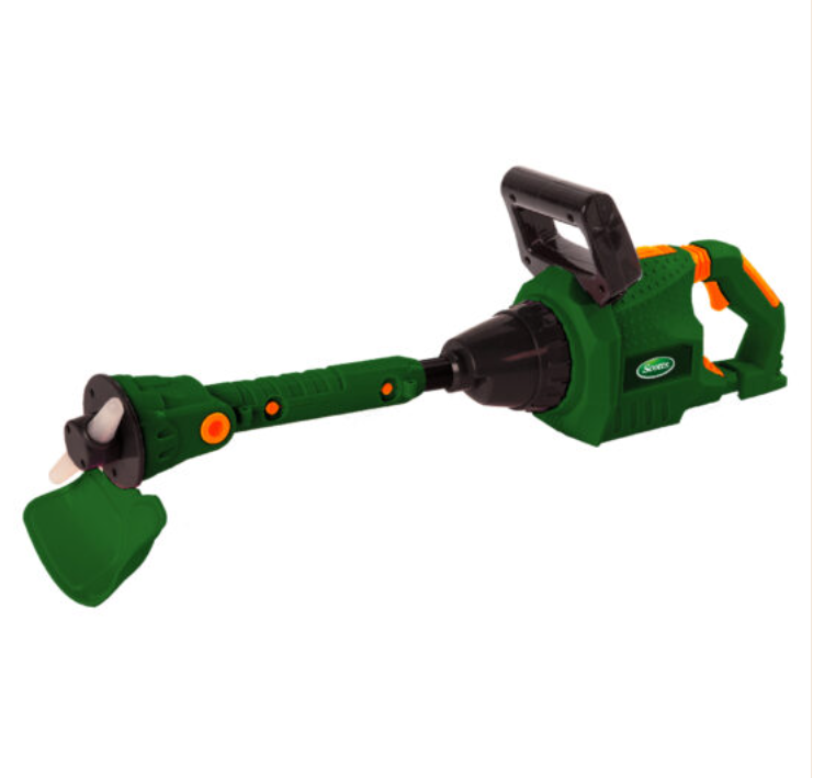 Green weed trimmer toy on a white background