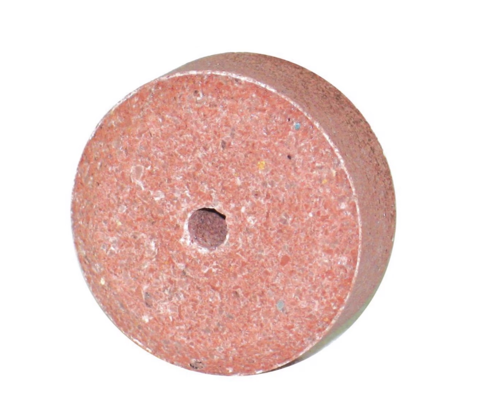 Red Trace Mineral Spool Lick wheel on a white background.