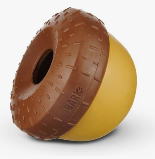 Brown and yellow acorn shaped dog toy with 'Bark' branding on a white background