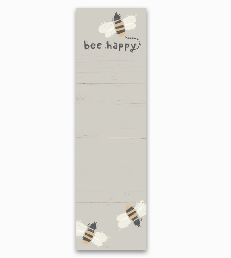Magnetic notepad featuring bees and "bee happy" sentiment on a white backgroung.