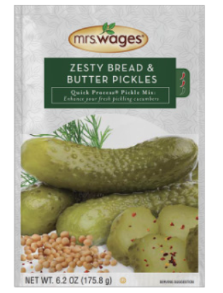 Packet of Mrs. Wages zesty bread & butter pickle mix on a white background.