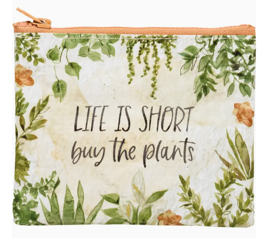 Pouch with floral design and text 'Life is short, buy the plants' on a light background