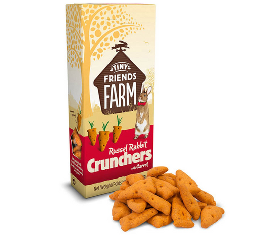 Box of Tiny Friends Farm Russell Rabbit Crunchers with carrots on a white background