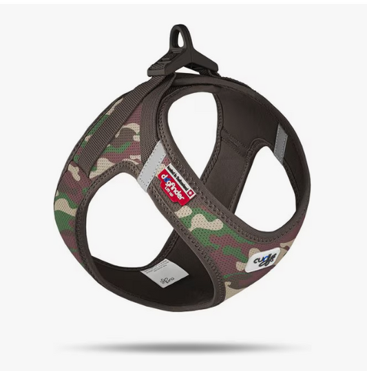 Camouflage-patterned dog harness with brand logo on a white background.
