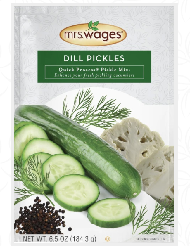Packet of Mrs. Wages dill pickle seasoning mix on a white background.