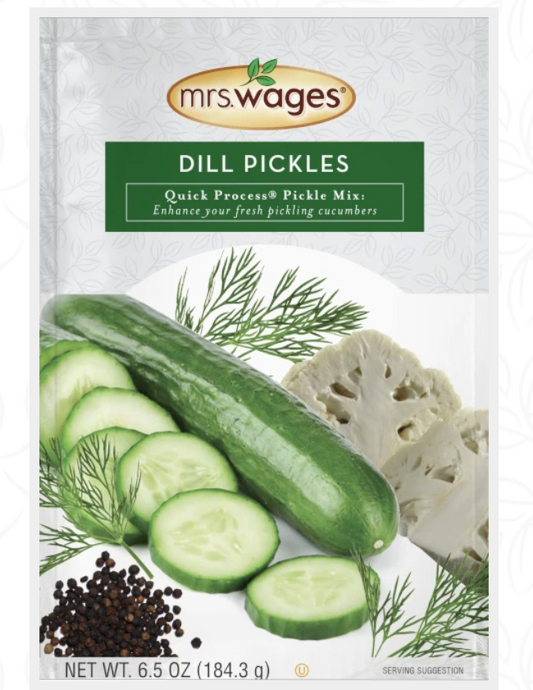 Packet of Mrs. Wages dill pickle seasoning mix on a white background.