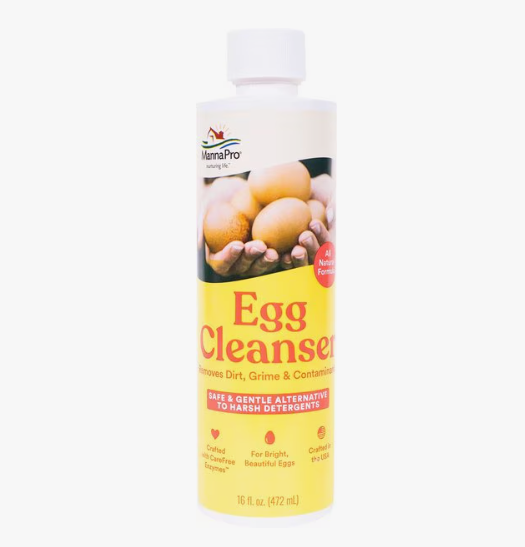 Bottle of MannaPro Egg Cleanser with a yellow label on a white background