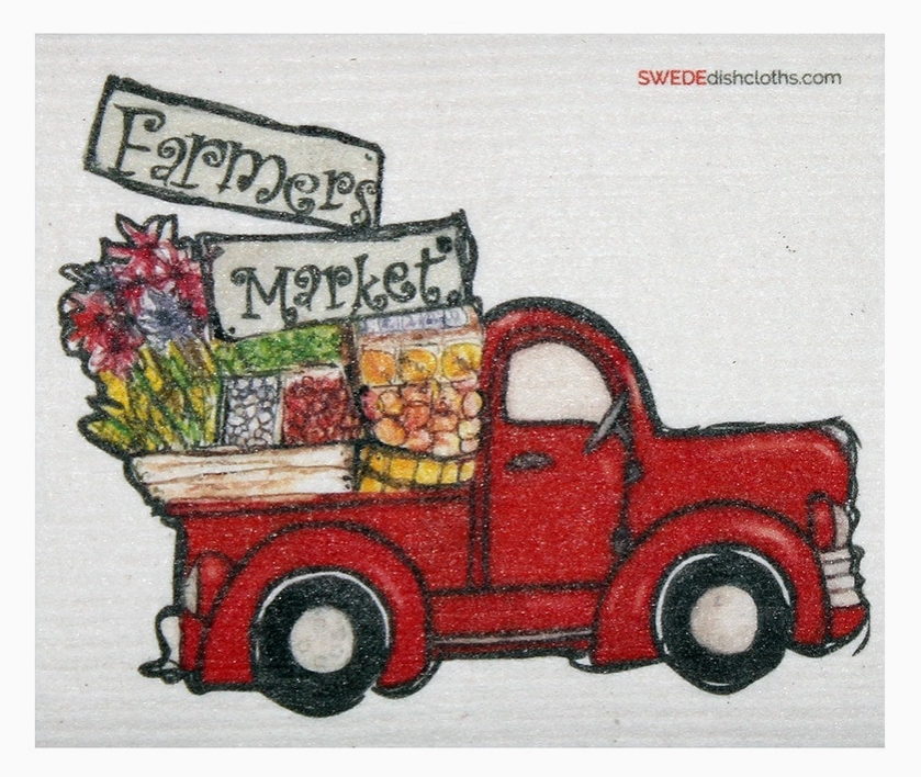 Red truck with 'Farmers Market' sign and produce on a white background, featuring the brand 'SWEDE Dishcloths'.