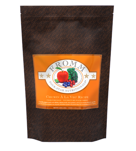 Brown pet food package with a colorful label featuring fruits and vegetables, on a white background.