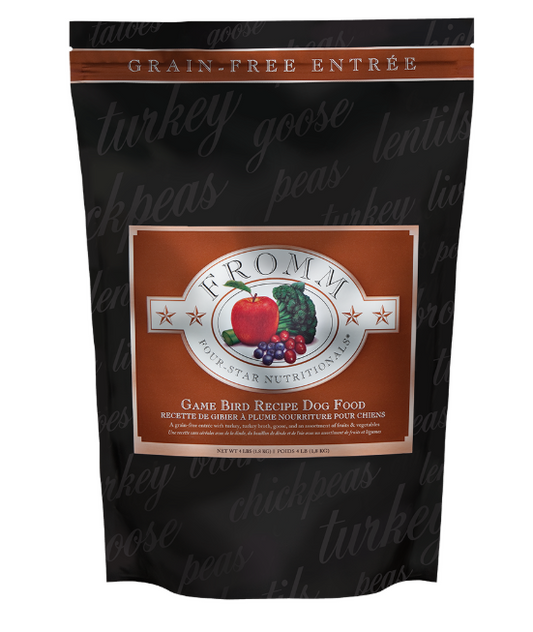 Bag of Fromm four star nutritional dog food with a black background