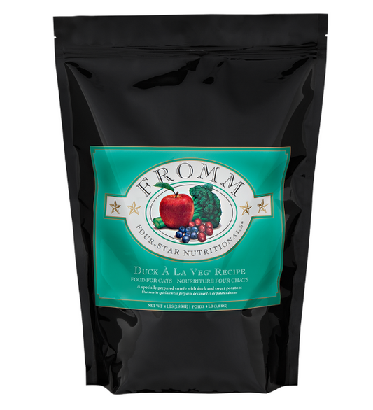Black pet food package with a green label featuring the 'Fromm' brand on a white background