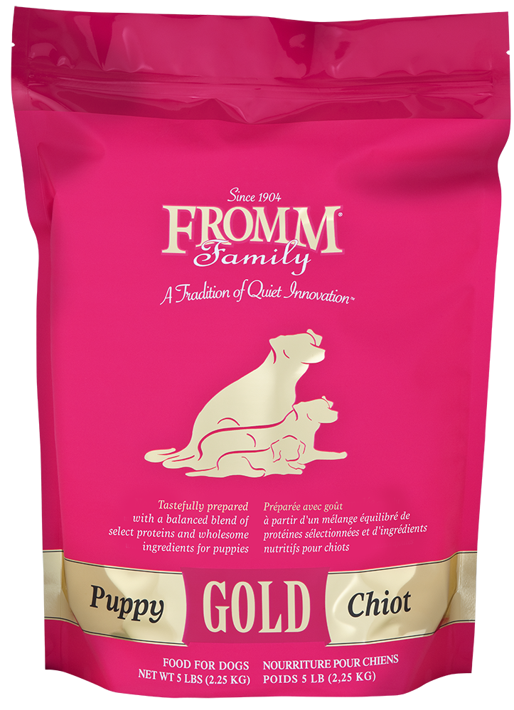 Pink package of Fromm Family Puppy Gold dog food with a gold label