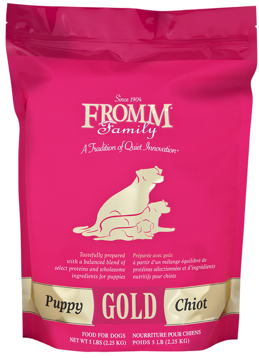 Pink package of Fromm Family Puppy Gold dog food with a gold label