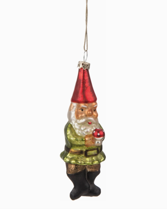 Glass gnome ornament with a red hat and green outfit on a white background