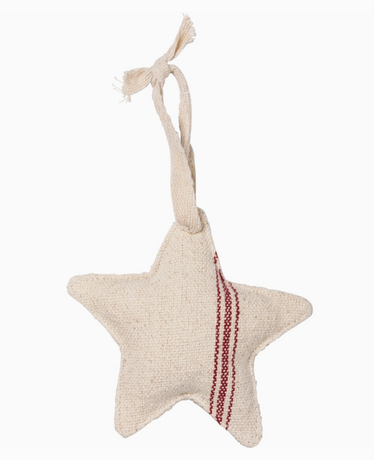 Star-shaped fabric ornament with a red stripe on a white background
