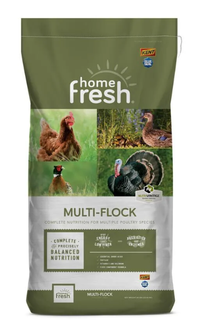 Home Fresh Multi-Flock chicken feed packaging with images of chickens and turkeys on a green background.