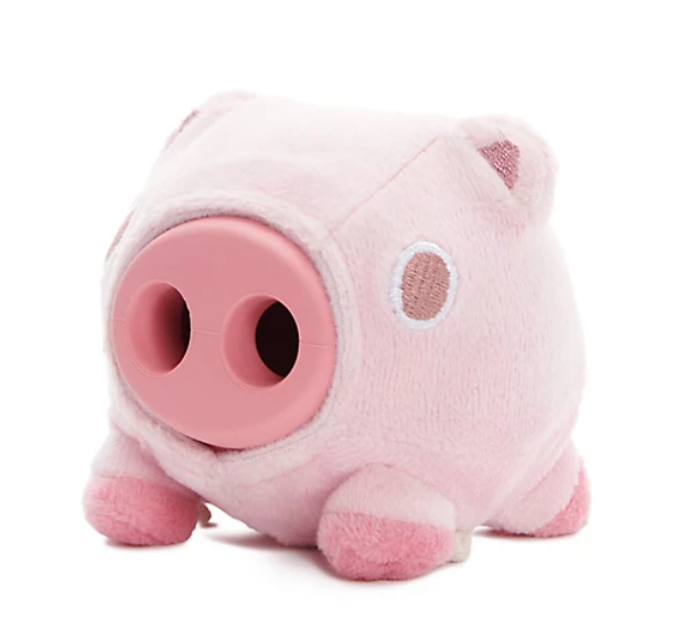 Pink plush pig toy on a white background