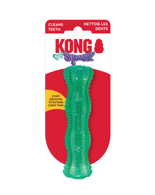 Green KONG Squeezz dog toy on a red packaging background