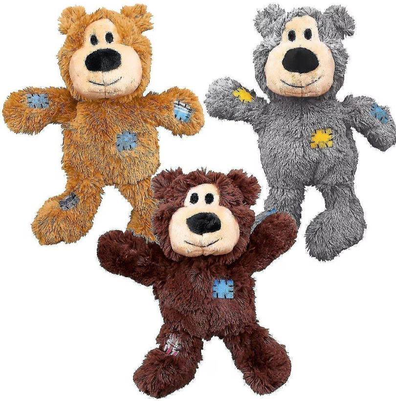 Three plush bear toys in brown, gray, and orange on a white background
