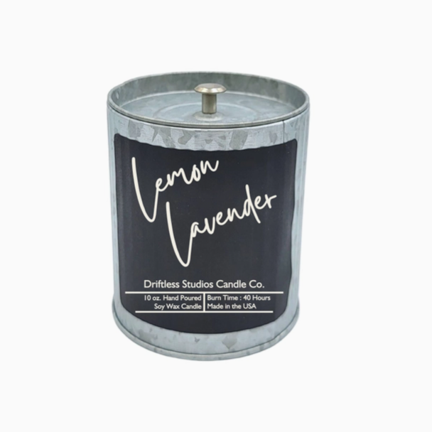 Lemond Lavender scented candle in a tine container with lid on a white background.