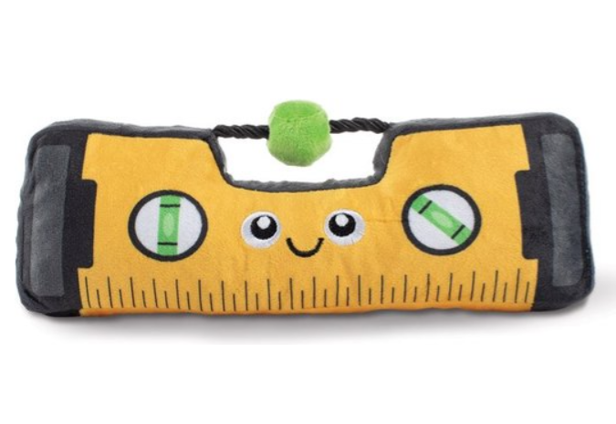 Plush toy shaped like a level with a happy face on a white background