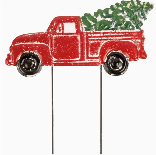 Red truck with Christmas tree on a white background