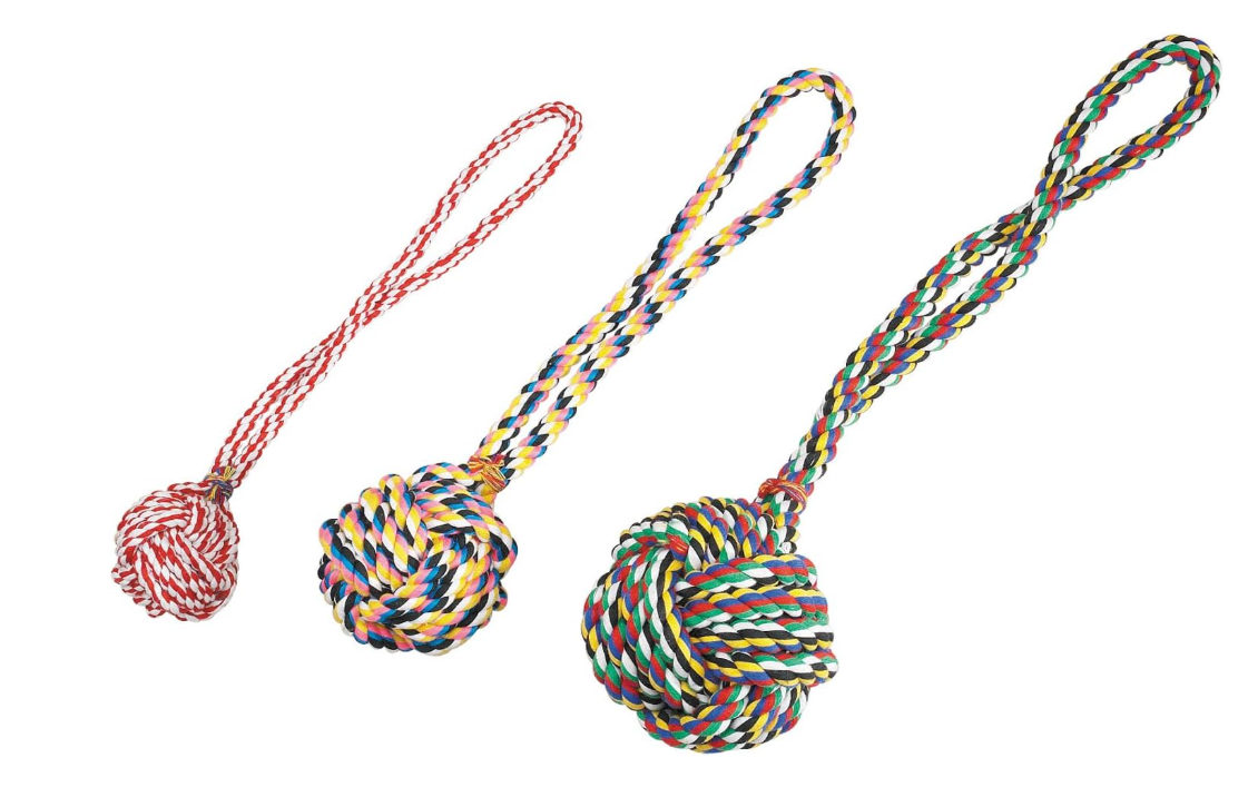 Three colorful rope toys with balls on a white background