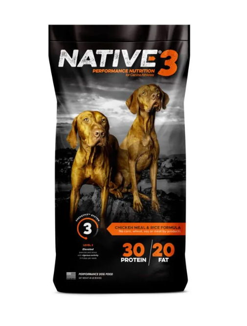 Bag of Native 3 dog food with two dogs on a mountainous background
