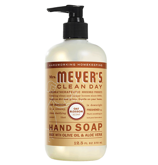 Bottle of Mrs. Meyers Oat Blossom scented liquid hand soap on a white background.
