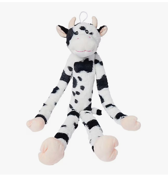 Plush cow toy with black and white pattern on a white background