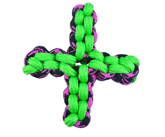 Cross-shaped rope toy with green and pink pattern on a white background