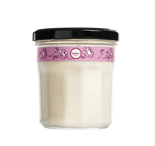 Mrs. Meyers Peony scented soy candle on a white background.