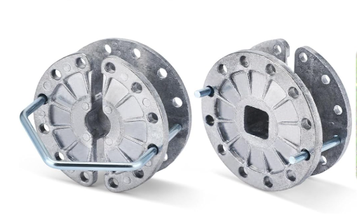 Two metal electric fence tighteners on a white background.