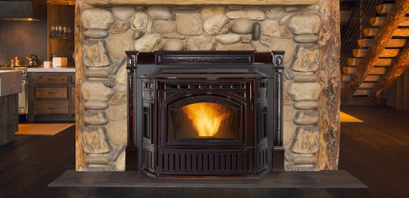 Wood-Pellet burning stove in a stone fireplace with a warm glow, surrounded by a cozy living room.