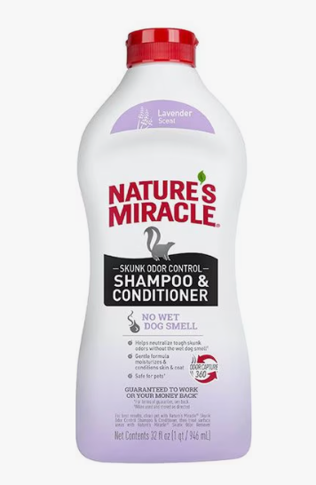 Bottle of Nature's Miracle skunk odor control shampoo on a white background.