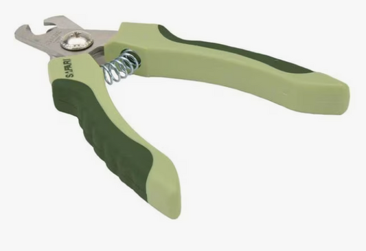 Green and silver dog nail clipper on a white background