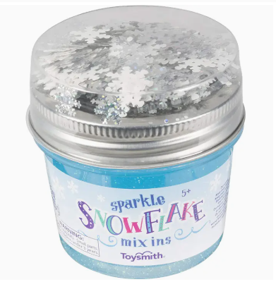 Jar of sparkle snowflake mix ins with a labeled lid on a white background