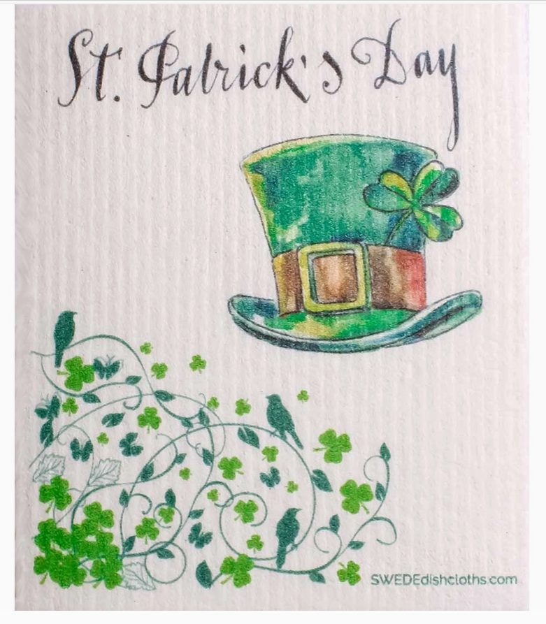 St. Patrick's Day-themed dishcloth with a green hat and shamrocks on a white background.