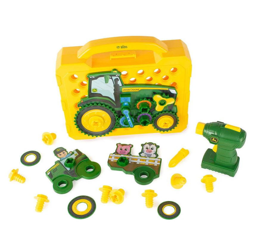 Toy construction set with a yellow toolbox, green tractor, and various tools on a white background