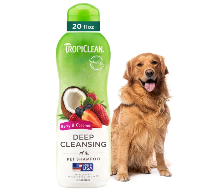 Tropiclean dog shampoo bottle with a golden retriever on a white background