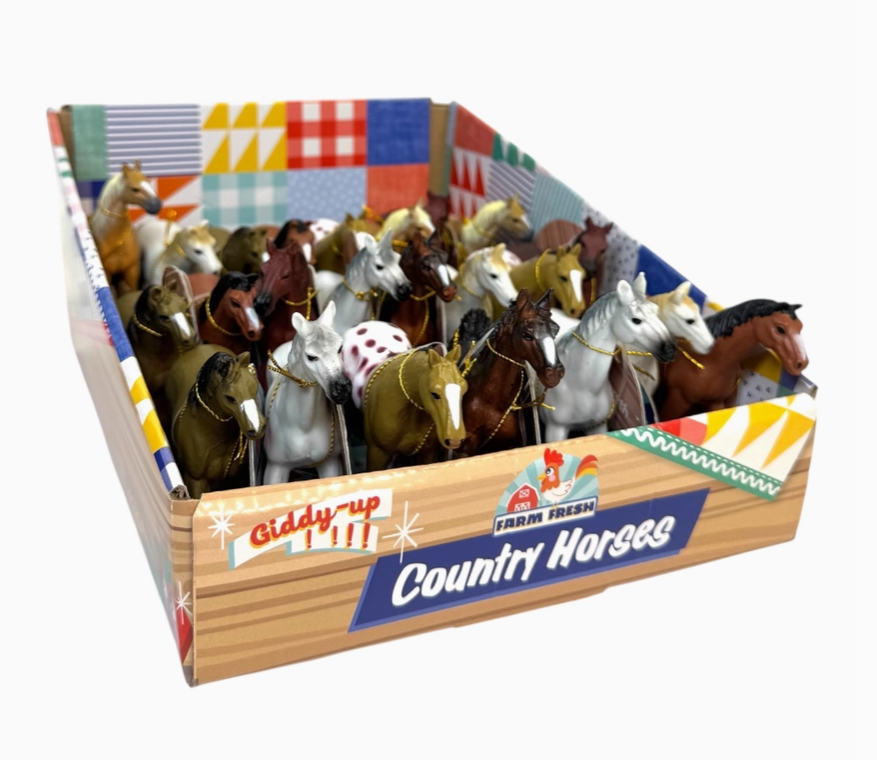 Box of toy horses with a colorful label on a white background