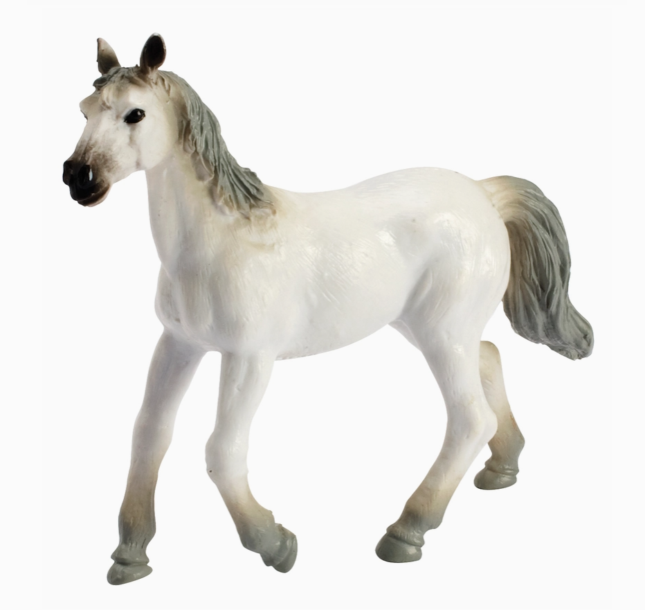White horse figurine on a white background