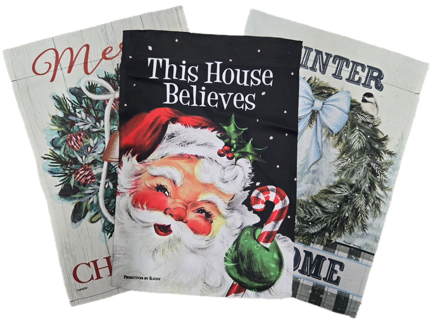Three Christmas-themed flags with Santa Claus and winter scenery.